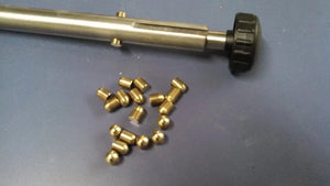 Brass bullets for a locking shaft on a vintage Unisaw tilt and elevation handle