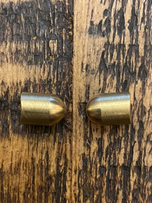 Brass bullets for a locking shaft on a vintage Unisaw tilt and elevation handle